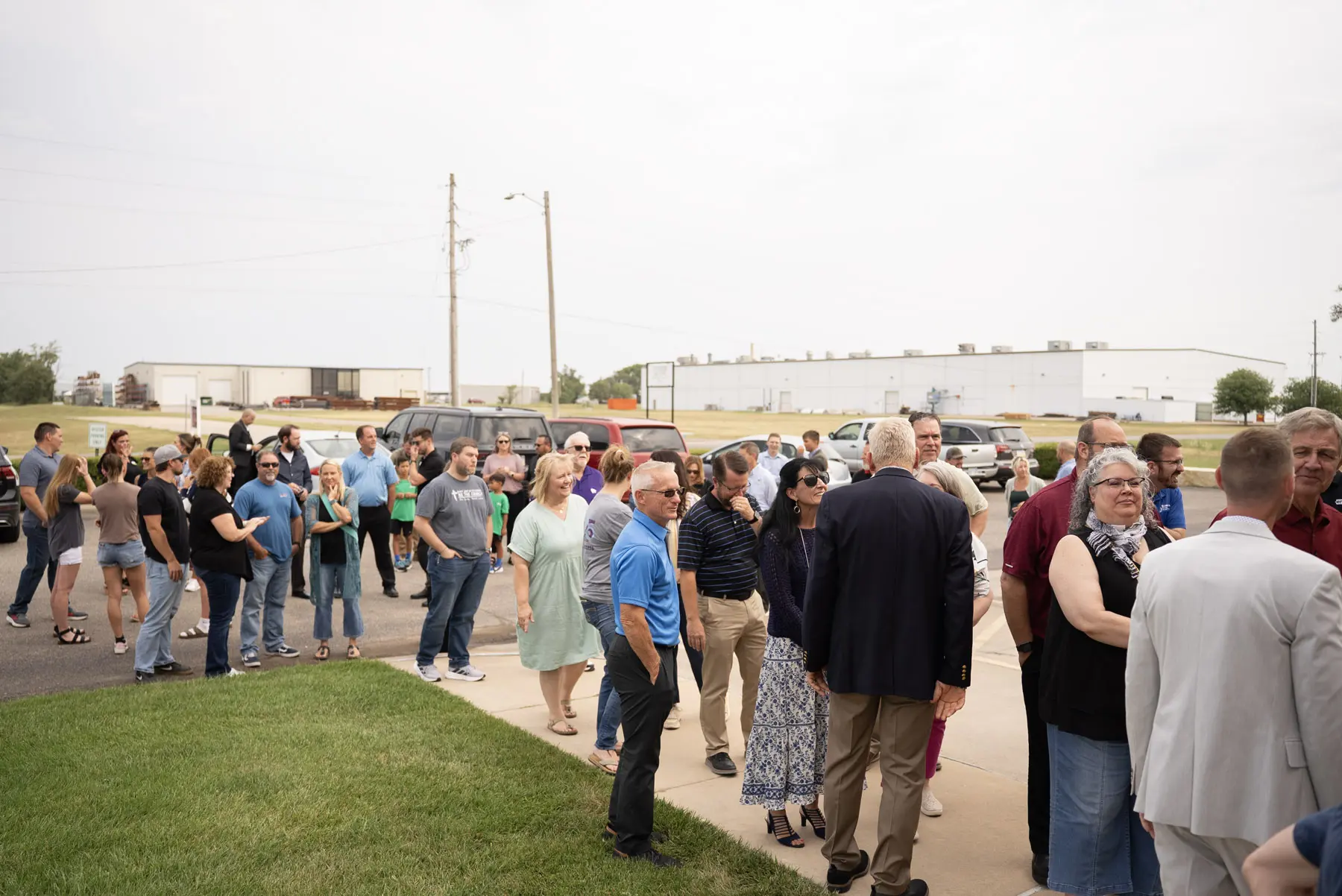 Enegren ribbon cutting event guests